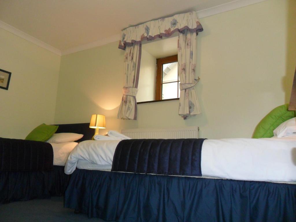 Stag Coach House Hotell Carmel Rum bild